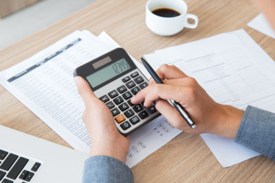 accountant holding a calculator
